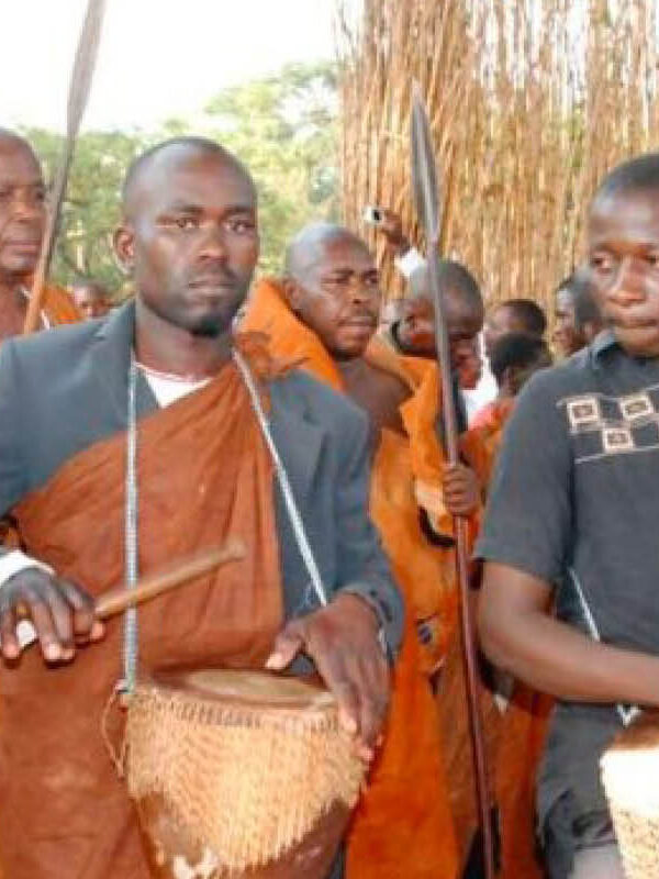 Traditional drummers performing during a royal cultural ceremony in the Bunyoro Kingdom, Uganda.