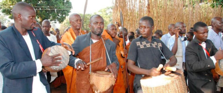 Traditional drummers performing during a royal cultural ceremony in the Bunyoro Kingdom, Uganda.