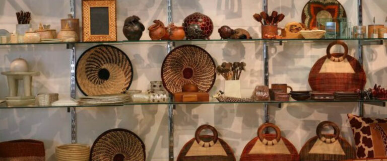 Traditional handmade baskets, pottery, wood carvings and artisan crafts displayed during a craft workshop in Uganda