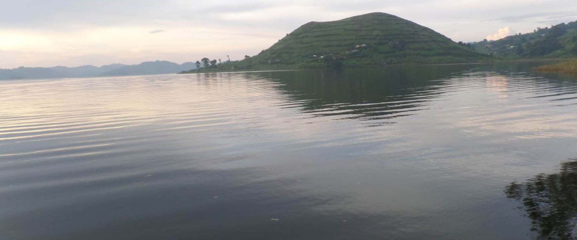Scenic view of Lake Bunyonyi surrounded by terraced hills in the Kigezi region of southwestern Uganda.