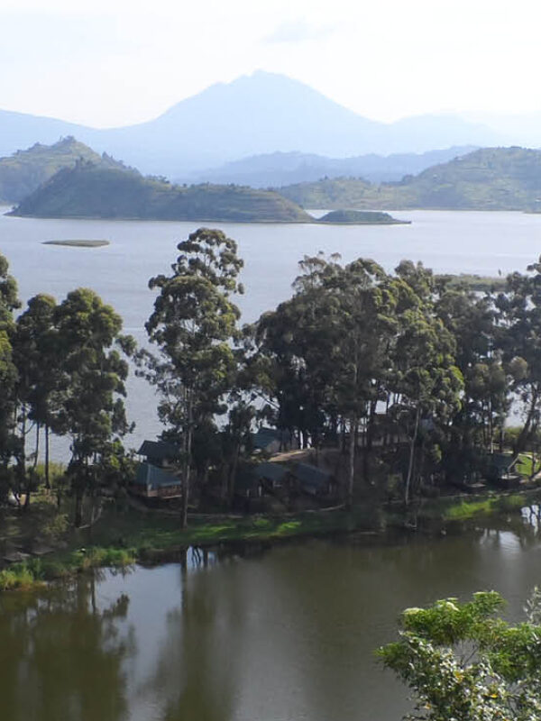 Panoramic view of Lake Mutanda with scenic islands and the Virunga Mountains in southwestern Uganda.