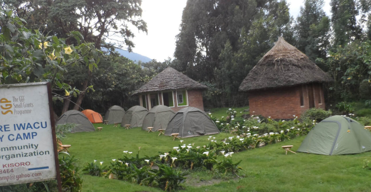 Batwa community camp near Mgahinga Gorilla National Park, Uganda, offering cultural experiences alongside gorilla trekking adventures.