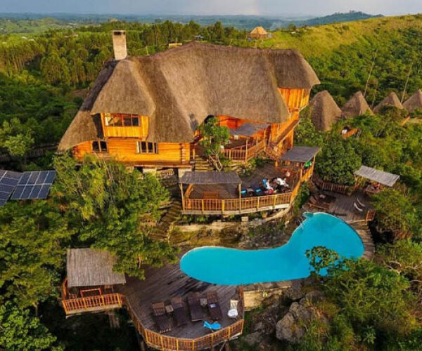 Luxury safari lodge overlooking Uganda’s wildlife landscapes.