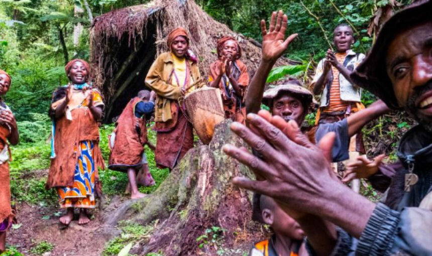 Batwa community members during a cultural experience in Uganda