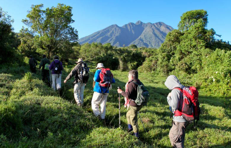 Nature Experiences in Uganda and Rwanda with hikers exploring a mountain landscape