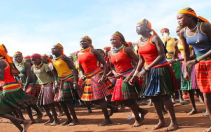 Karamojong women performing traditional dance in Karamoja, Uganda