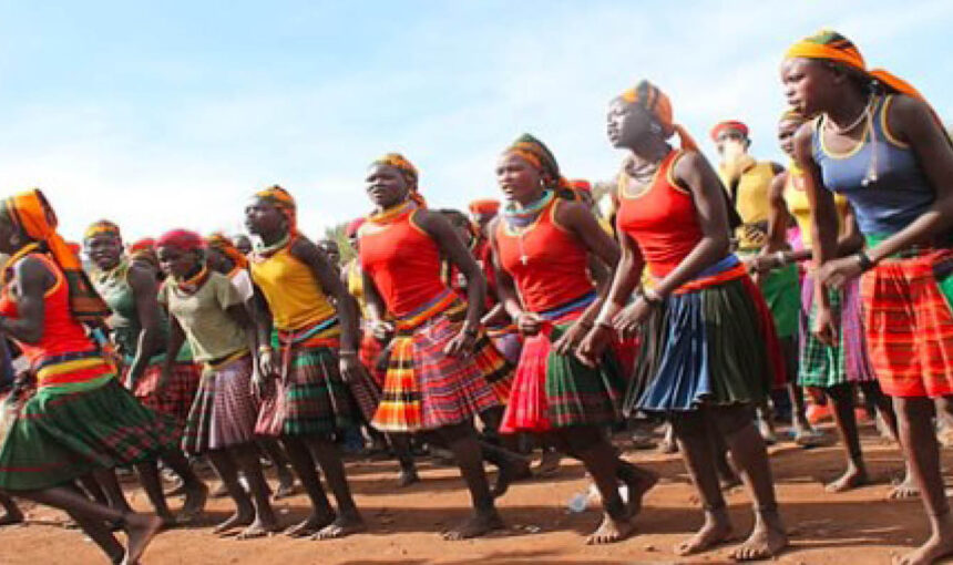 Karamojong women performing traditional dance in Karamoja, Uganda
