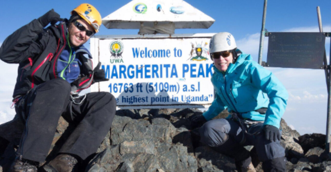 Climbers ascending a high-altitude trail in the Rwenzori Mountains of Uganda