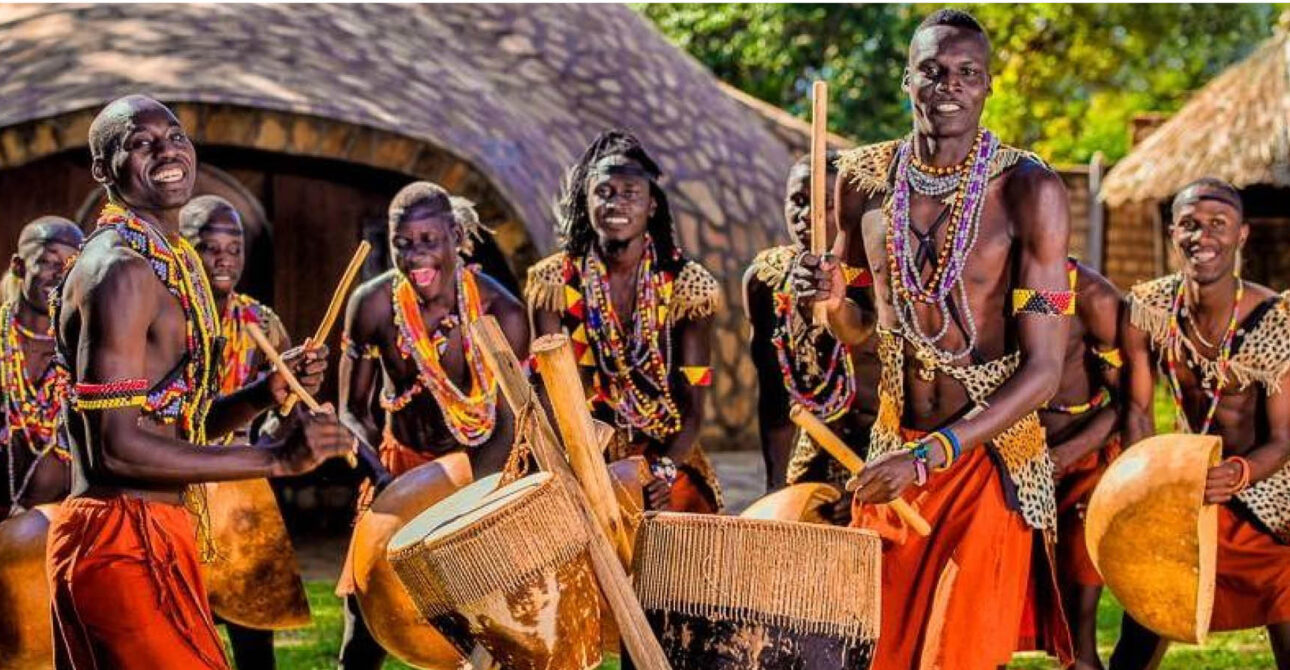 Traditional dancers and drummers during a cultural experience